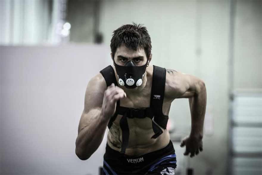 Former UFC Interim Welterweight World Champion Carlos Condit training with the elevation training mask.