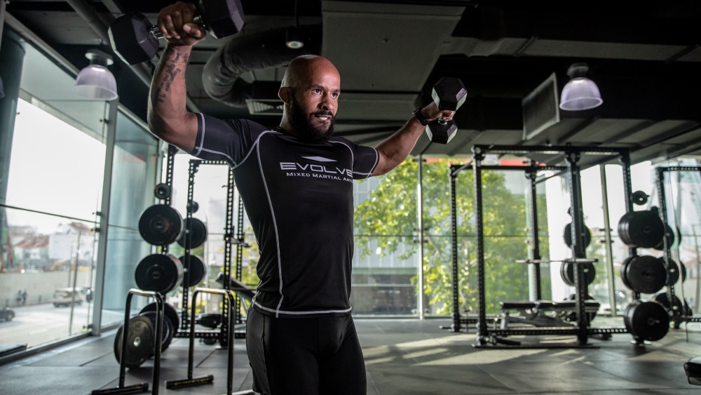 demetrious johnson exercise dumbbell
