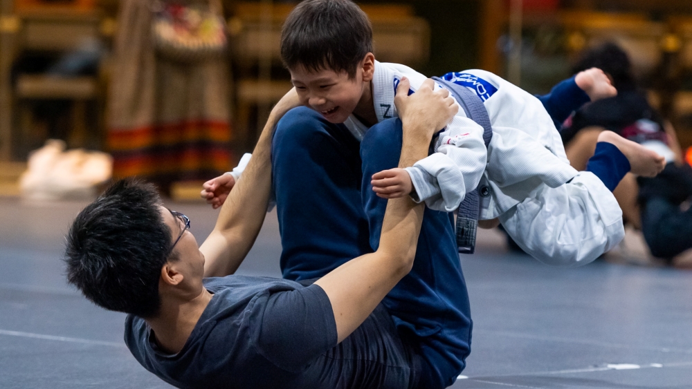 father and son family class bjj