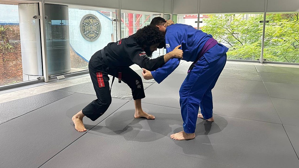 BJJ World Champion Rodrigo Marello demonstrating the snap down technique.